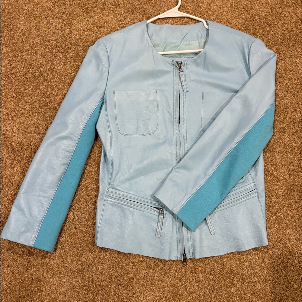 Cigno Nero light blue leather jacket.